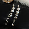 S925 silver needle Korean celebrity style pearl tassel long simple earrings for women - SHINNE